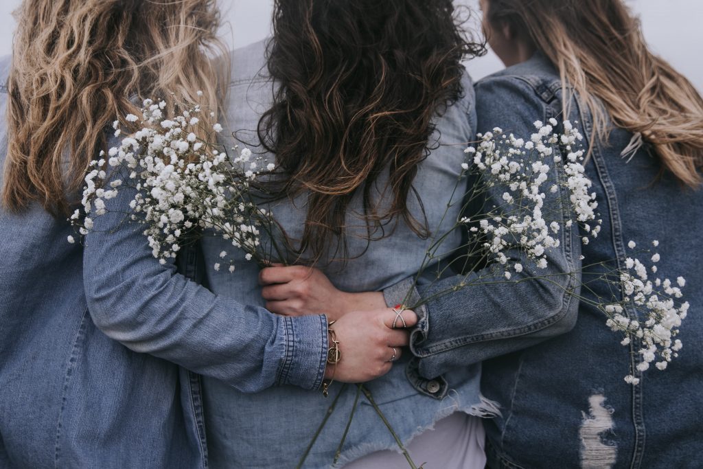 Three girls in jean jackets